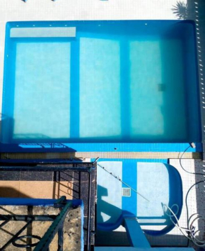 Modern two bedroomed Apartment with pool and bar.